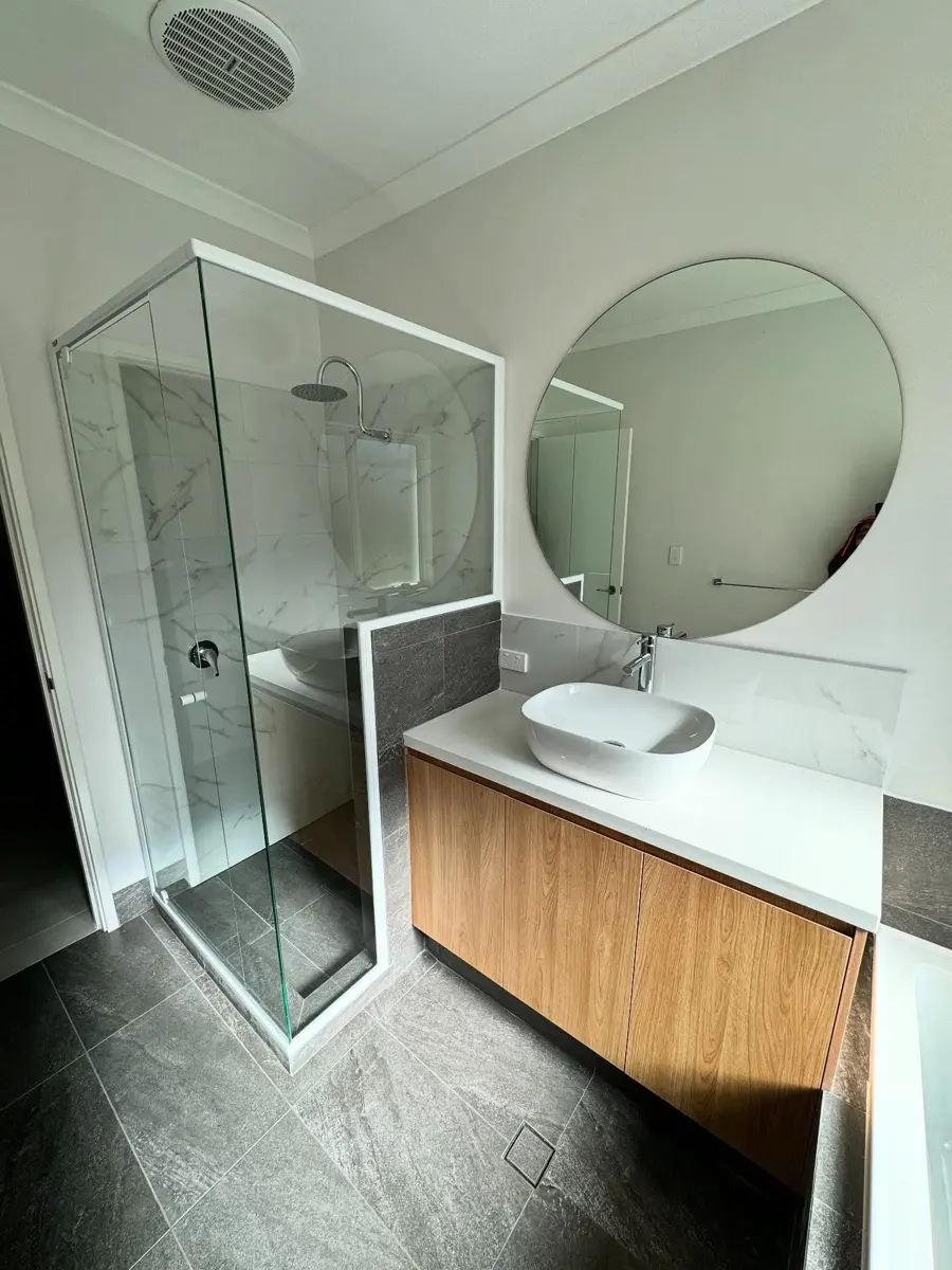 Custom bathroom mirror made and installed by Hightym