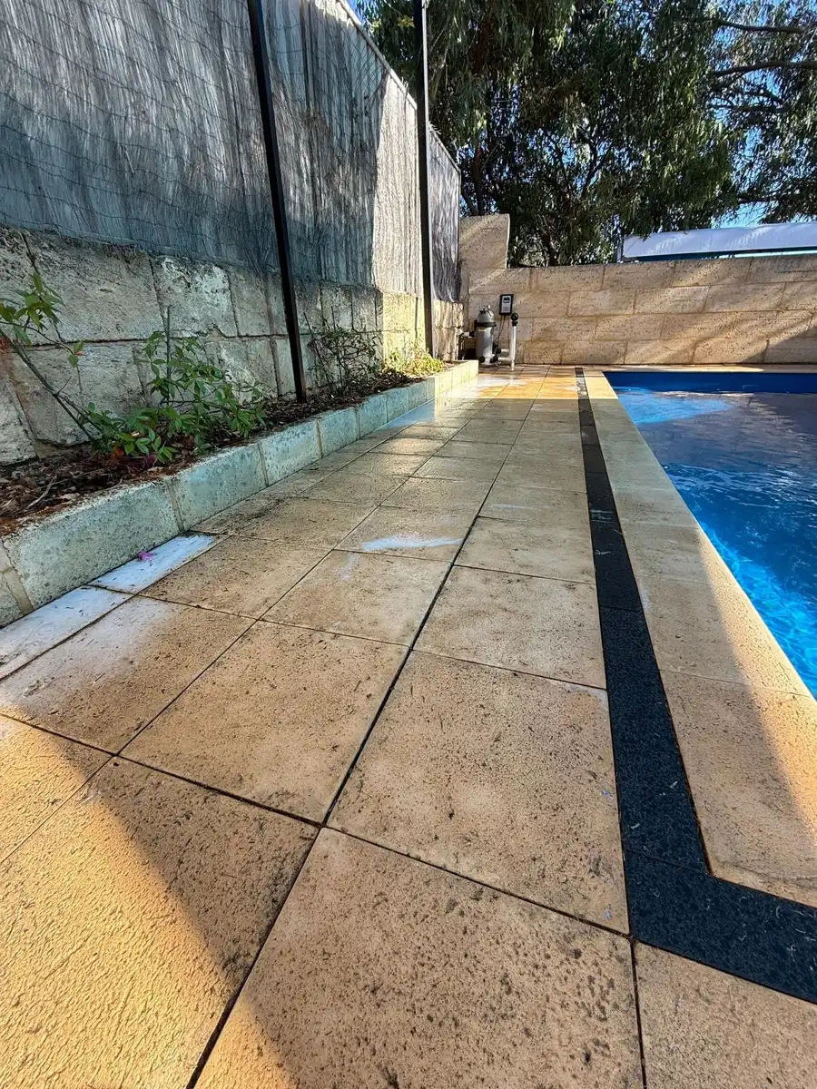 Pool surround paving pressure cleaned by Hightym