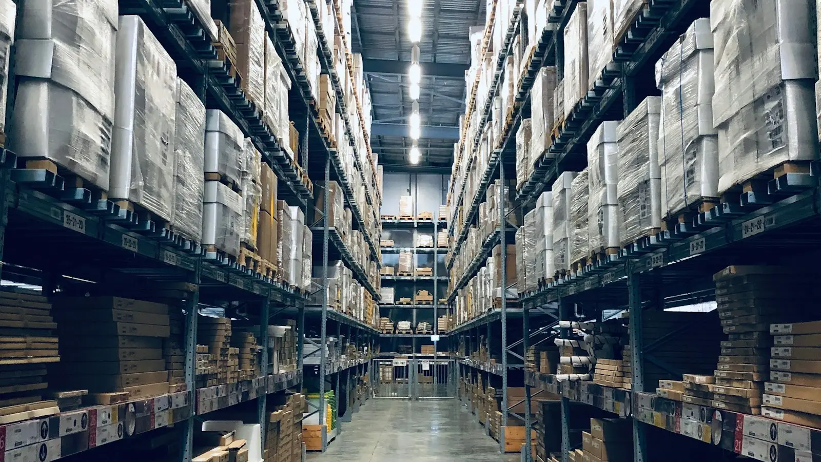 Clean, organised warehouse aisle with pallet racking